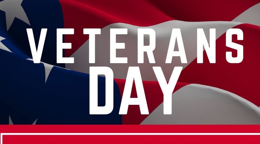 the American flag overlaid with the words "Veterans Day"