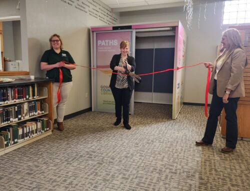 Ribbon Cutting for Telehealth Booth in Library